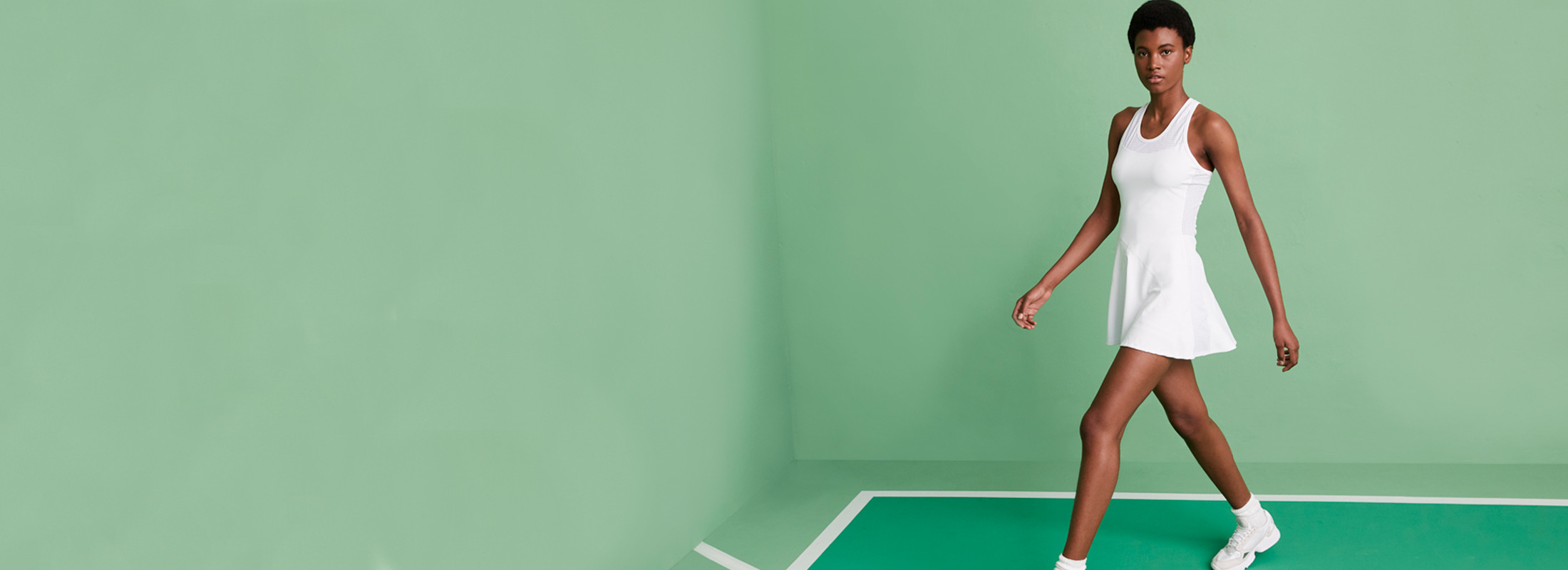 Tennis Capsule is Here. Click now to Shop the Capsule. Photo featuring our Serena Dress in White.