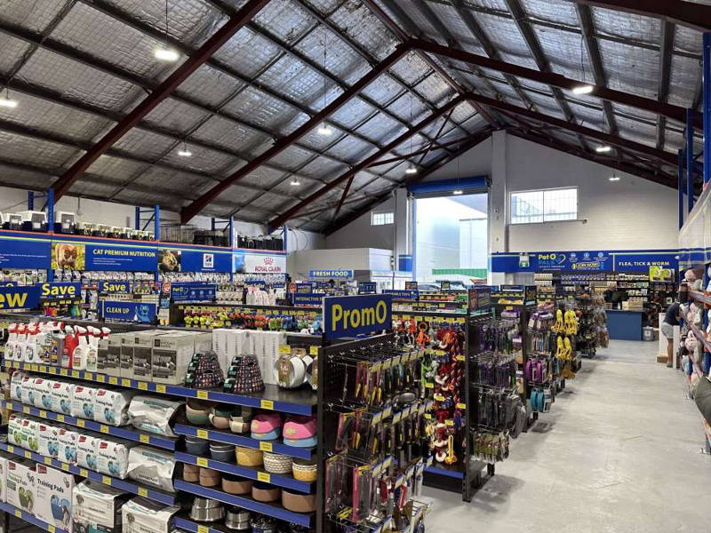Interior view of the PetO pet store in Caringbah showing shelves of pet supplies