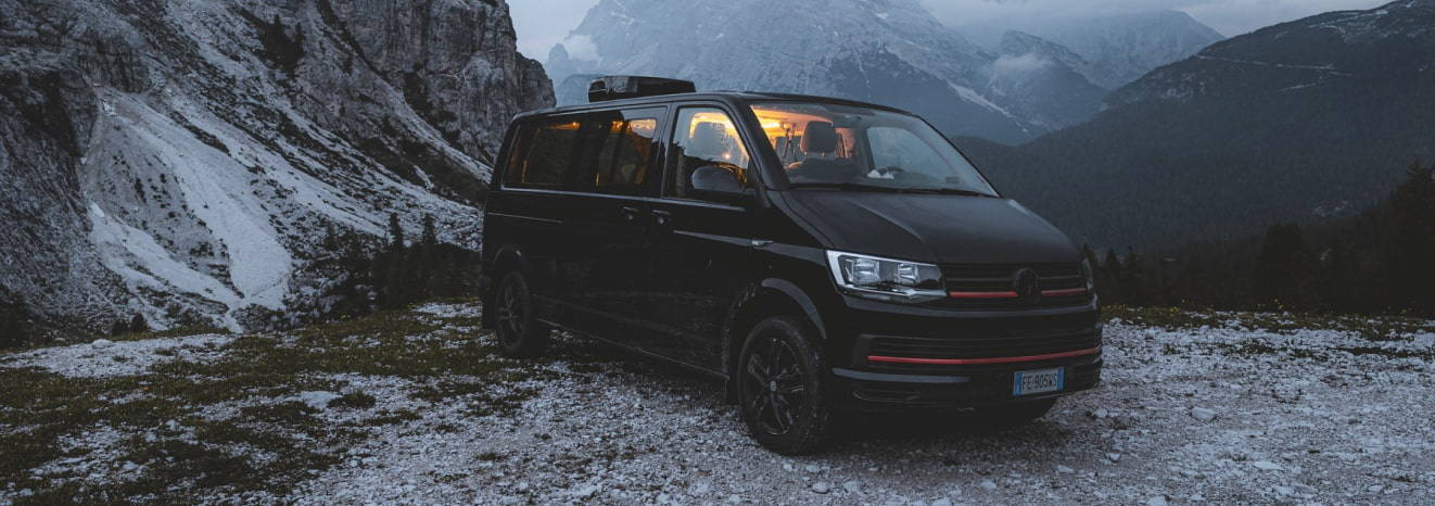 A van with a rooftop van air conditioner