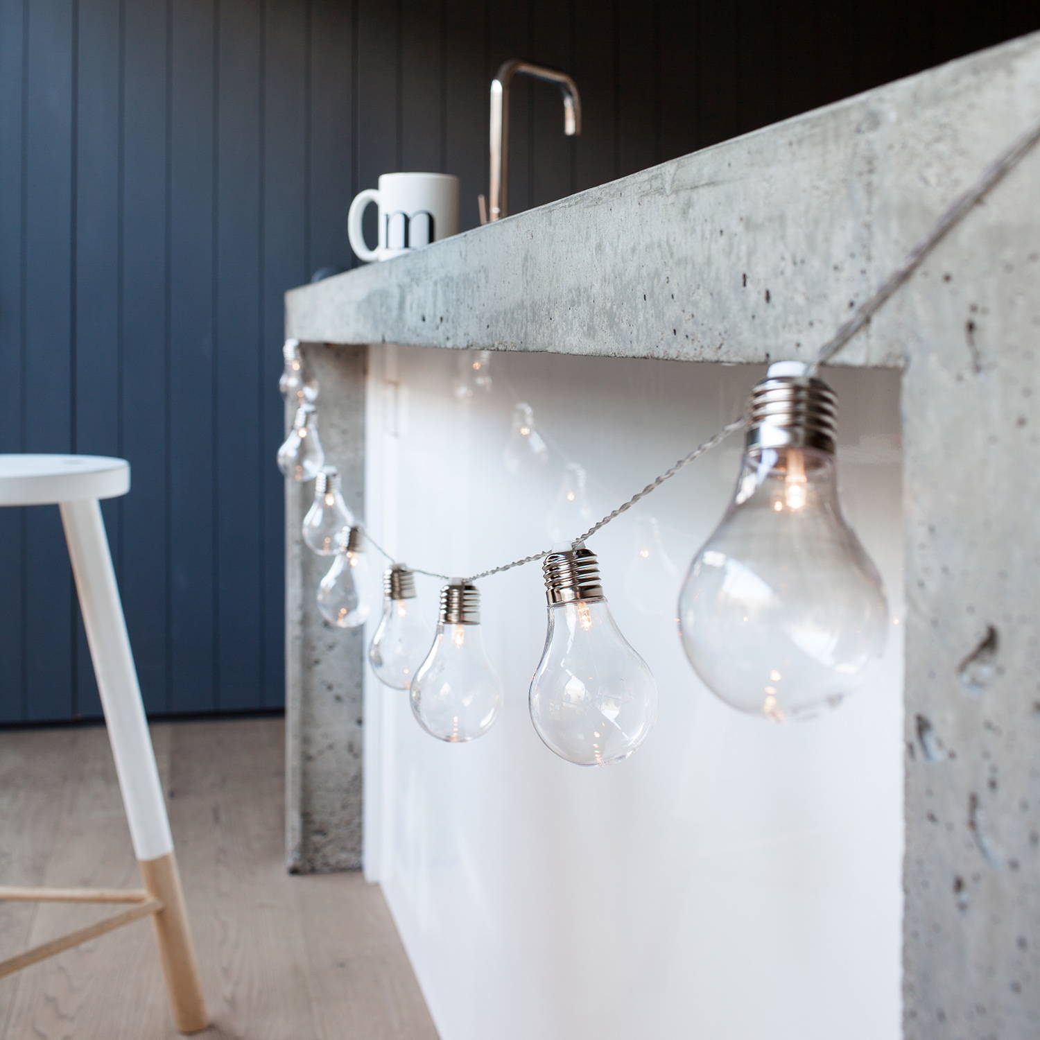 Edison battery festoon lights illuminated in kitchen