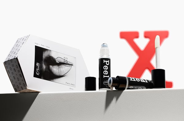 Cosmetic products displayed with a graphic of lips and a red 