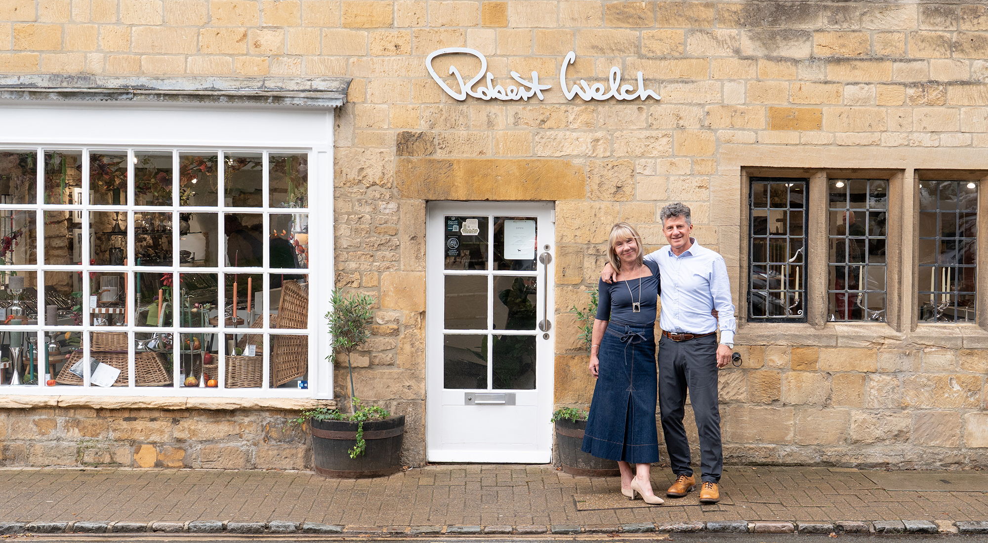 Alice and Rupert Welch in front of the Chipping Campden Studio Shop