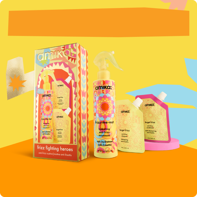 Hair care product packaging with colorful design and spray bottles.