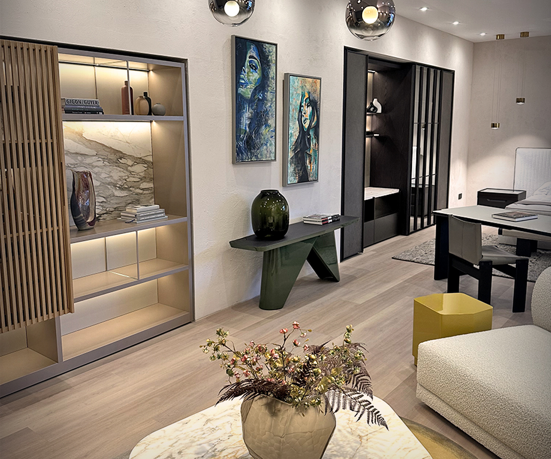 Modern Molteni living room with art, plants, and stylish furniture.