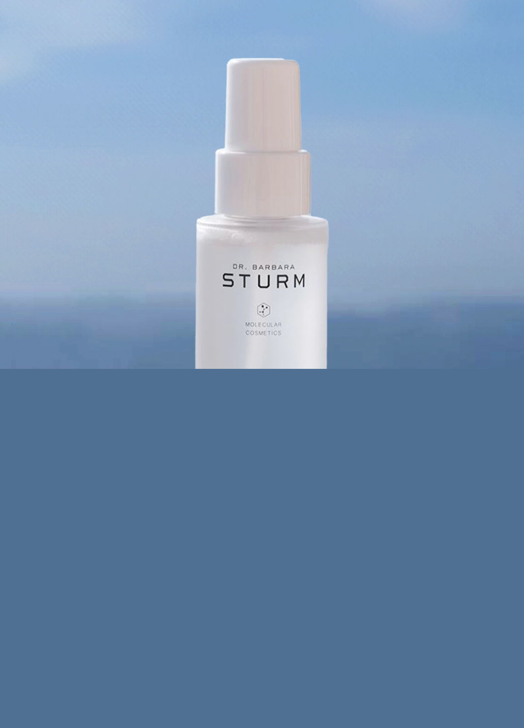 A bottle of skincare product against a blurred background.
