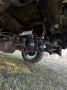 Train horn kit mounted under Ford F150