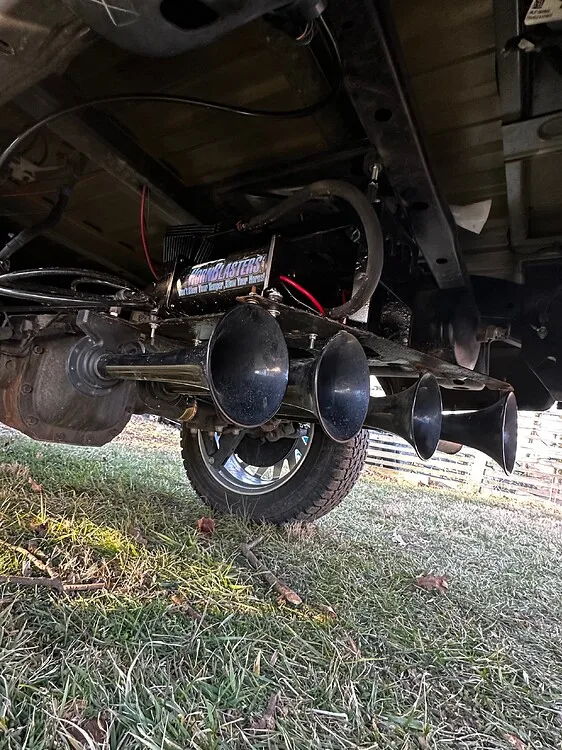 Train horn kit mounted under Ford F150