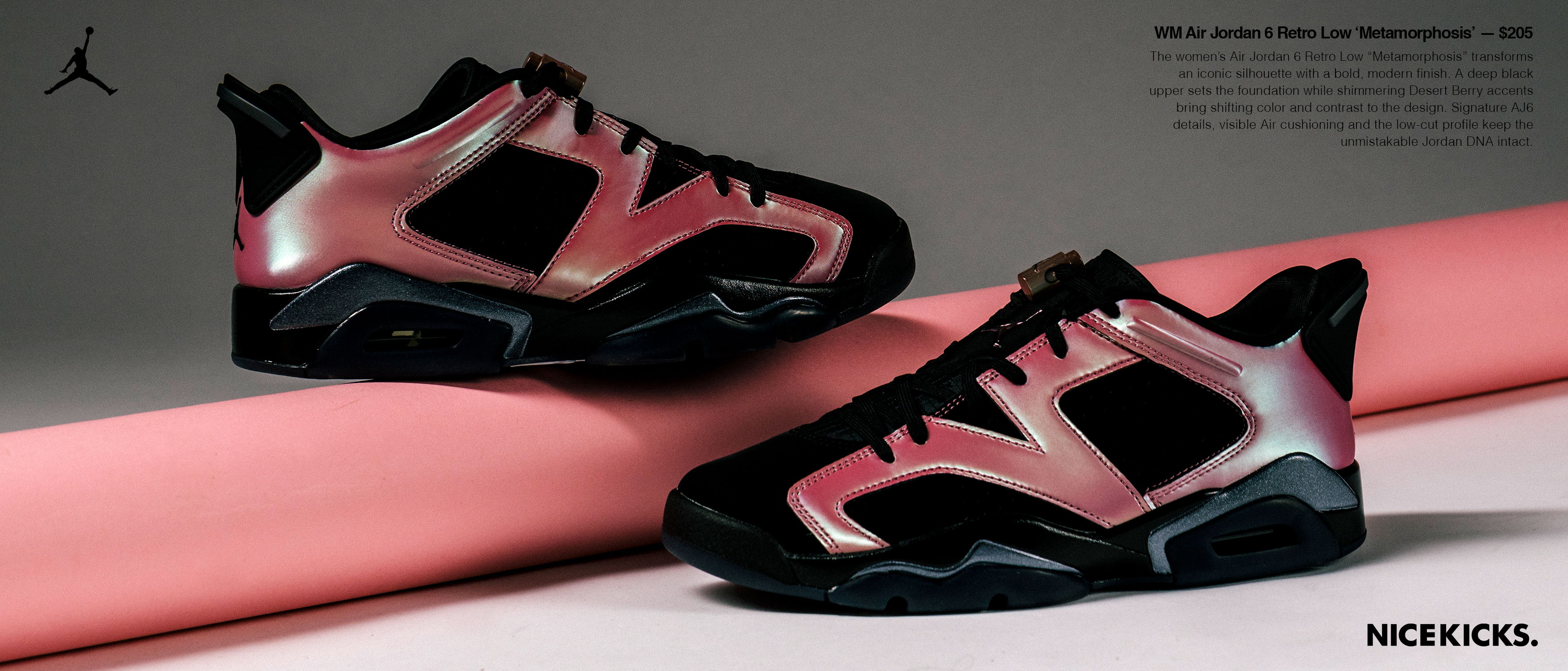 Black and pink Jordan shoes on a pink background.