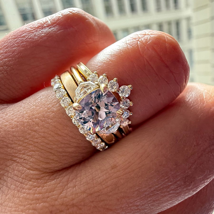 Cushion cut purple spinel ring with diamond bands