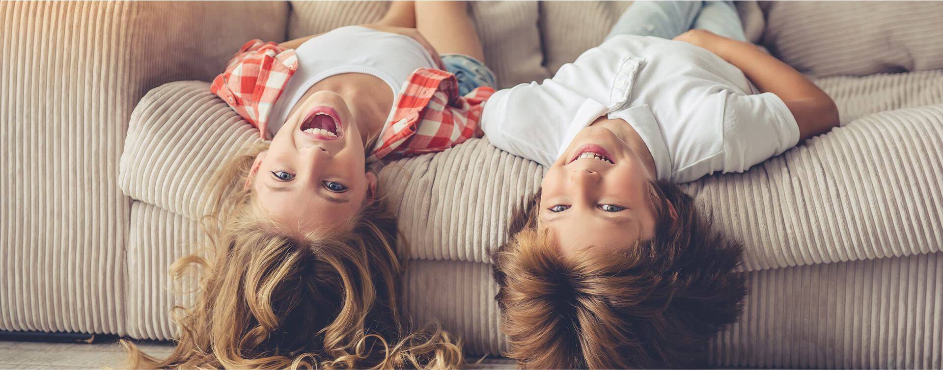 Children Playing On Sofa