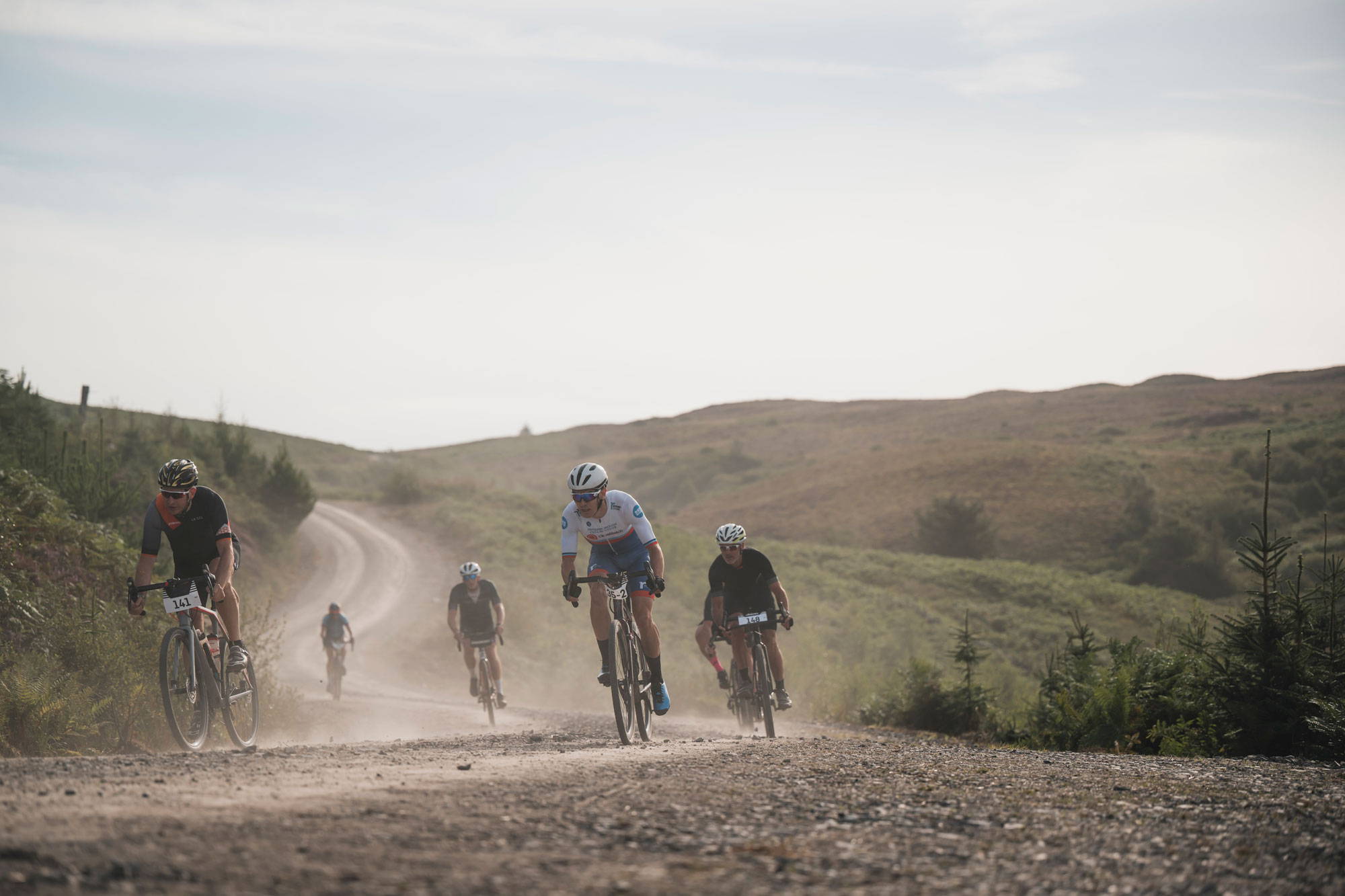 Bunch of gravel cyclists racing