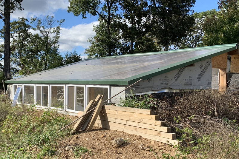 a photography taken of Dan Chiras’ Chinese greenhouse