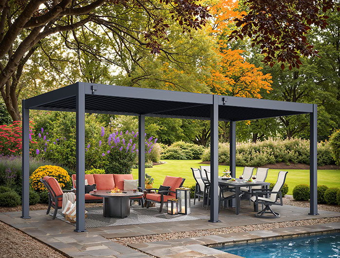 Outdoor patio with seating and a pergola by a pool.
