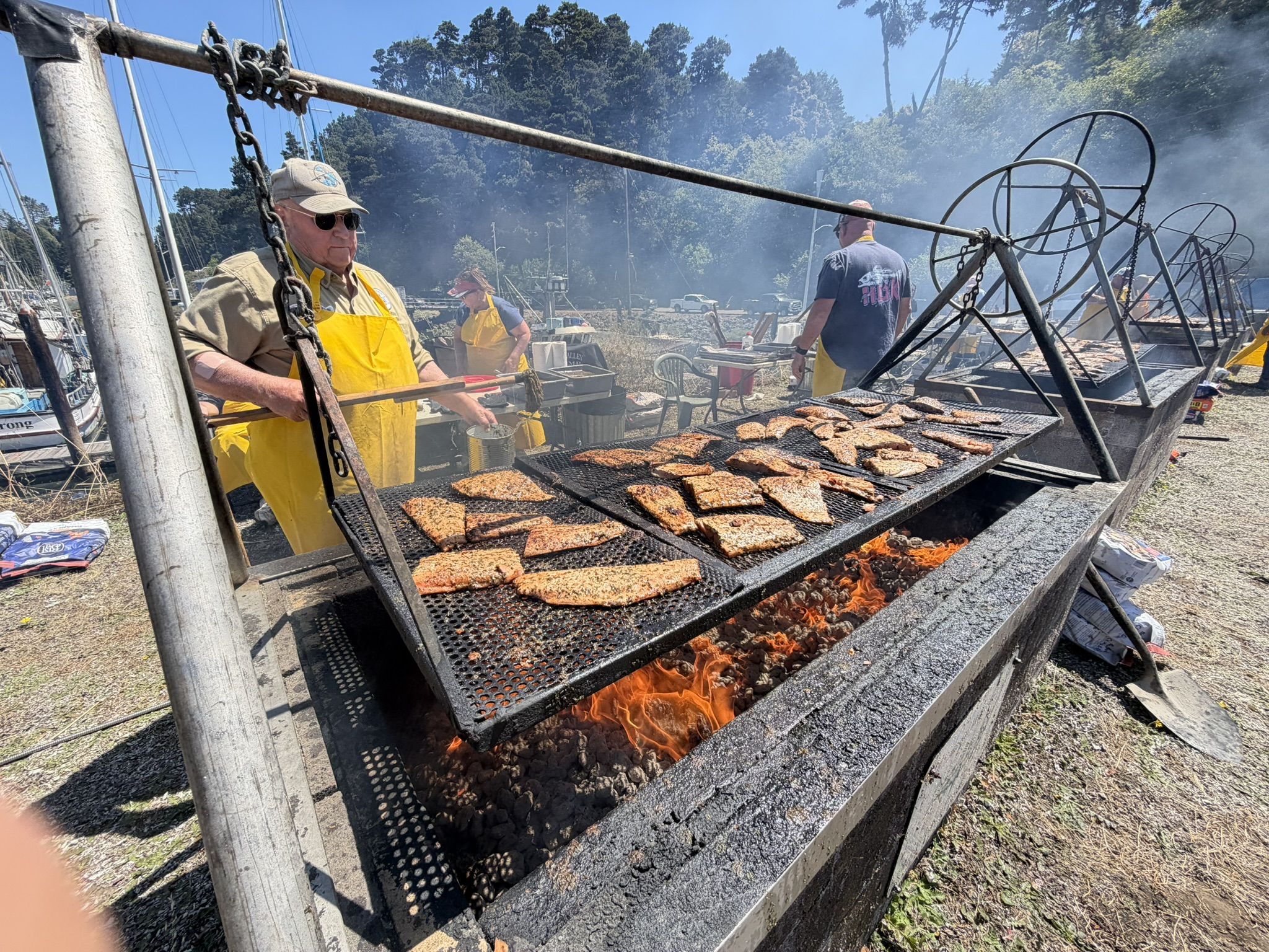 Grilling salmon at World's Largest Salmon BBQ