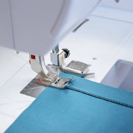 Using a magnetic seam guide for sewing a straight hem