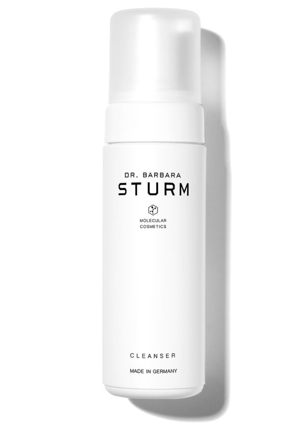 A white cleanser bottle with 