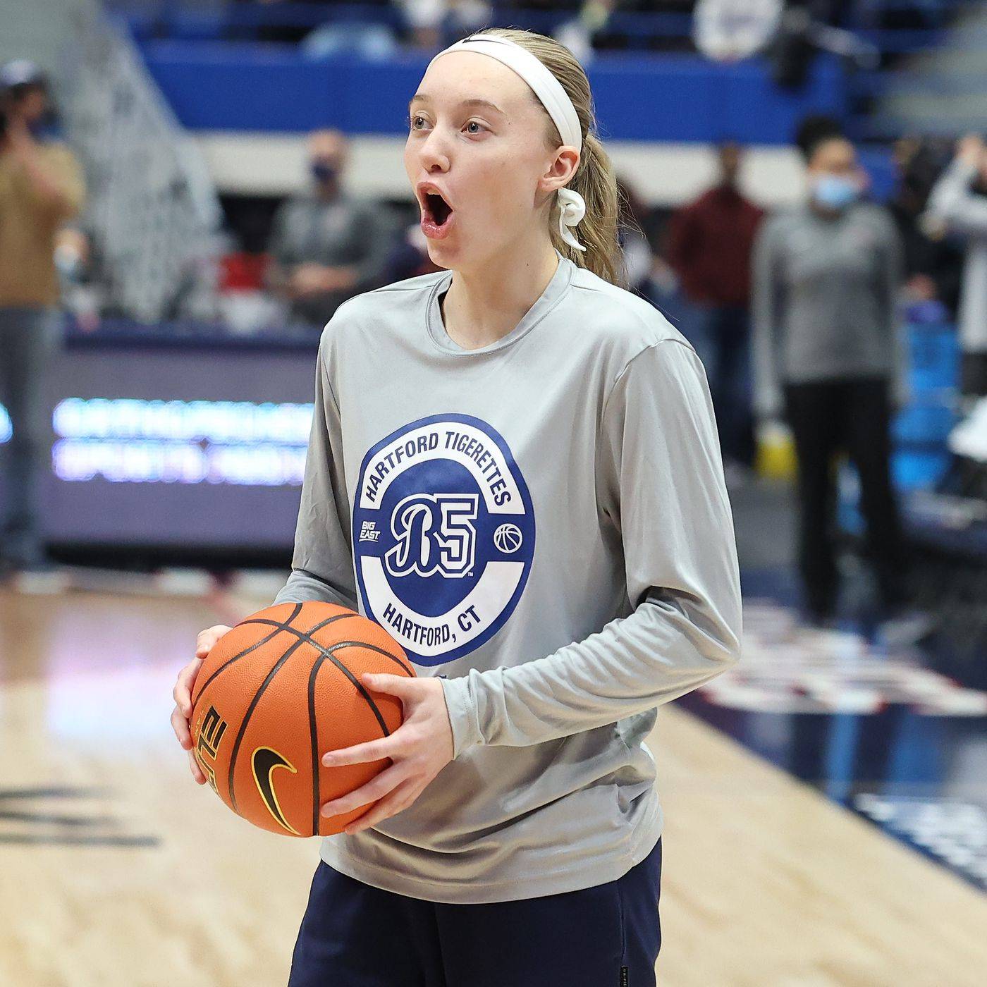 paige bueckers holding basketball