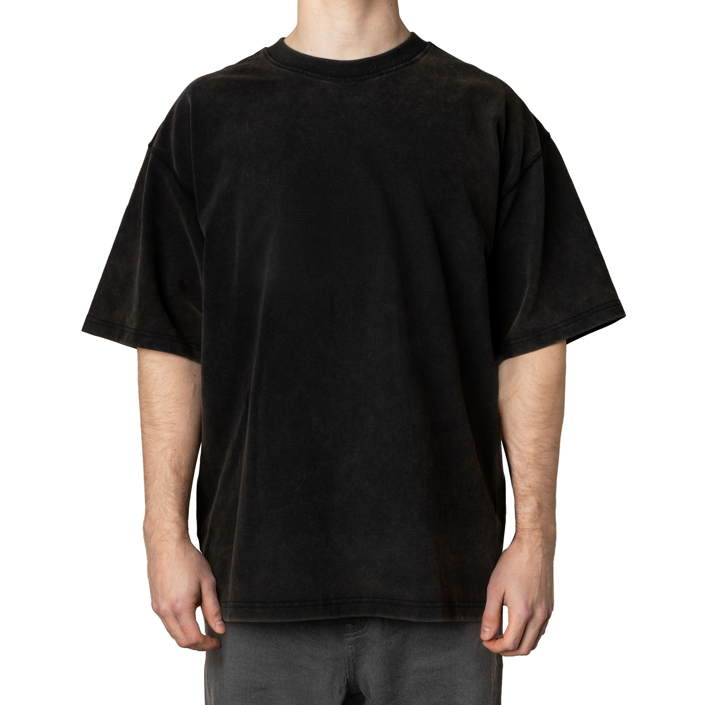Person wearing a black oversized t-shirt, standing in a neutral position.