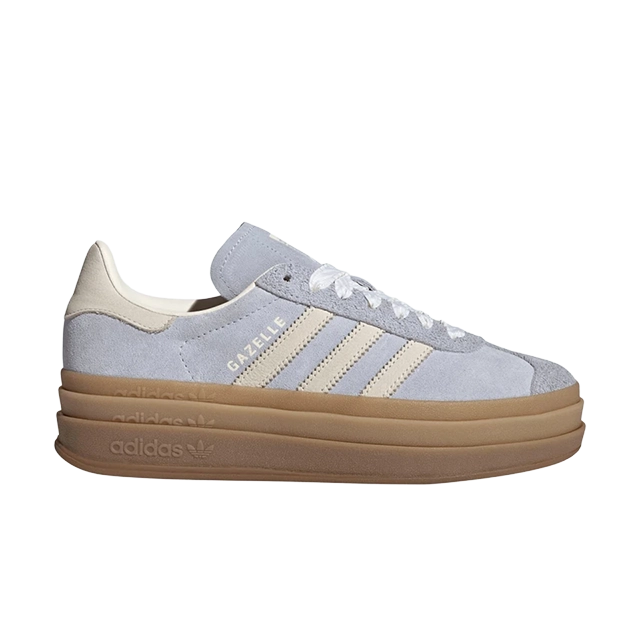 Light blue sneakers with three stripes and a gum sole.