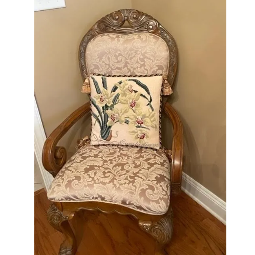 Needlepoint Pillow in chair