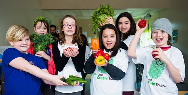 Little Green Thumbs' students with their EarthBox harvest