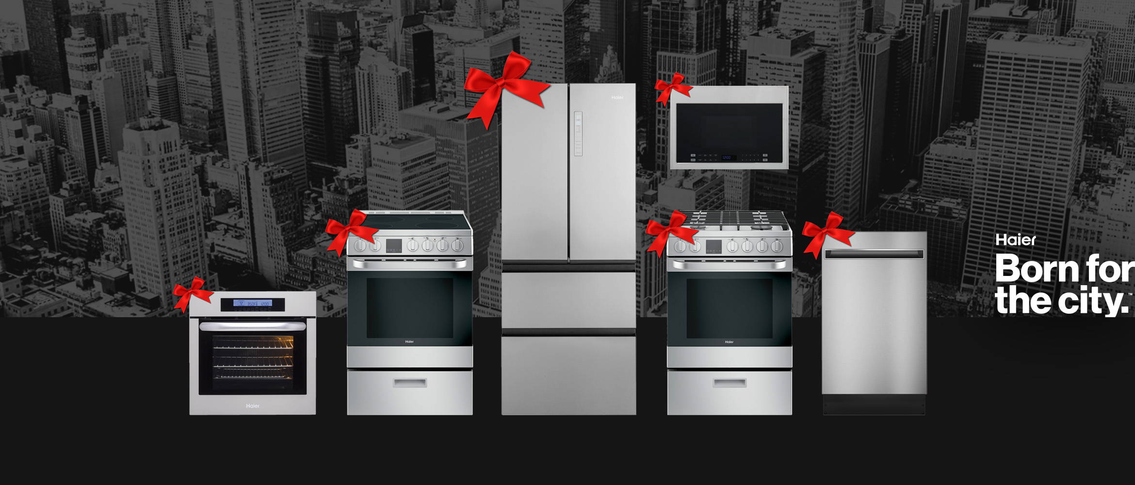 Assortment of Haier appliances with holiday bows on them.