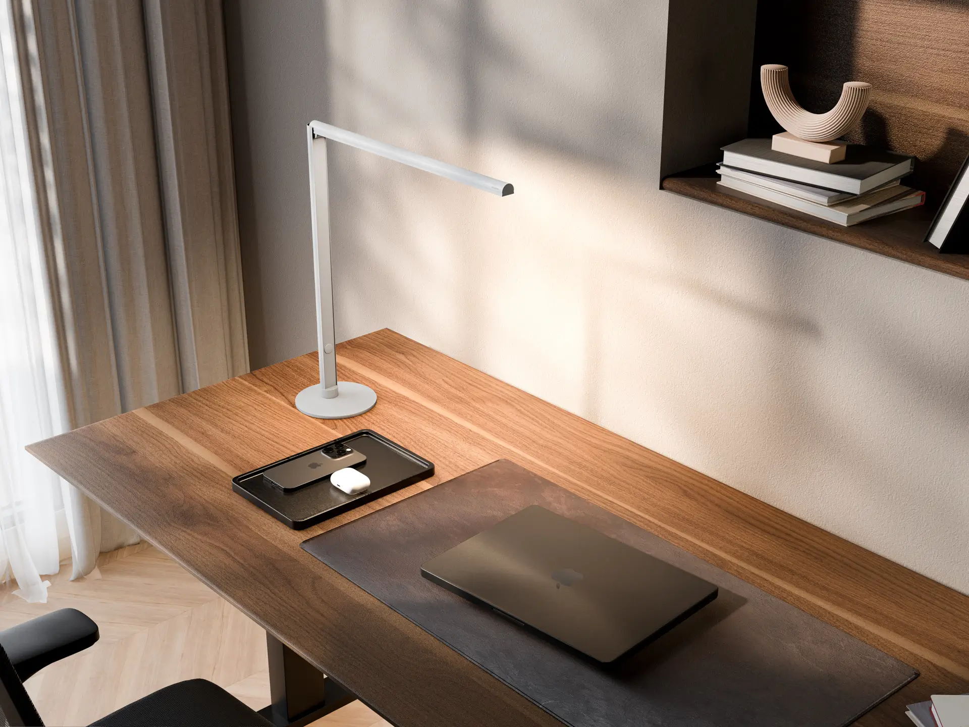 Red Dot Award “Best of the Best” 2026: ofinto Lumino Desk in white in a minimalist home office, featuring an ofinto Elevate with a walnut tabletop