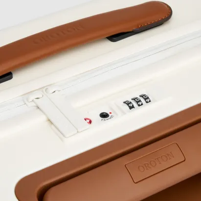 Close-up of a suitcase handle and lock mechanism.