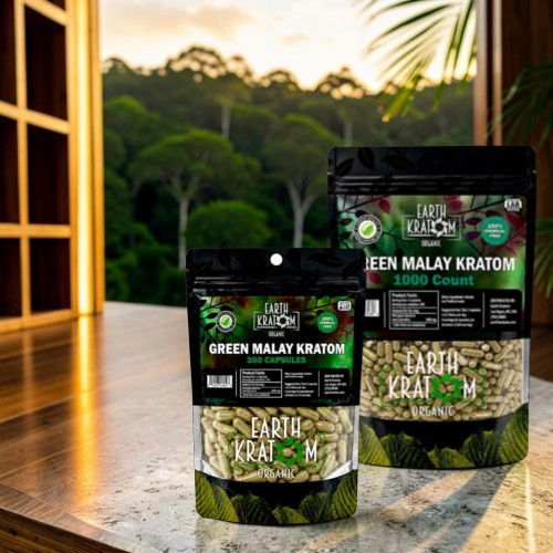 Bags of Green Malay Kratom on a wooden table with a forest background.