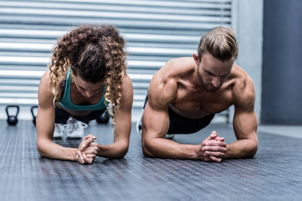 man and woman doing planks why men need collagen more than women
