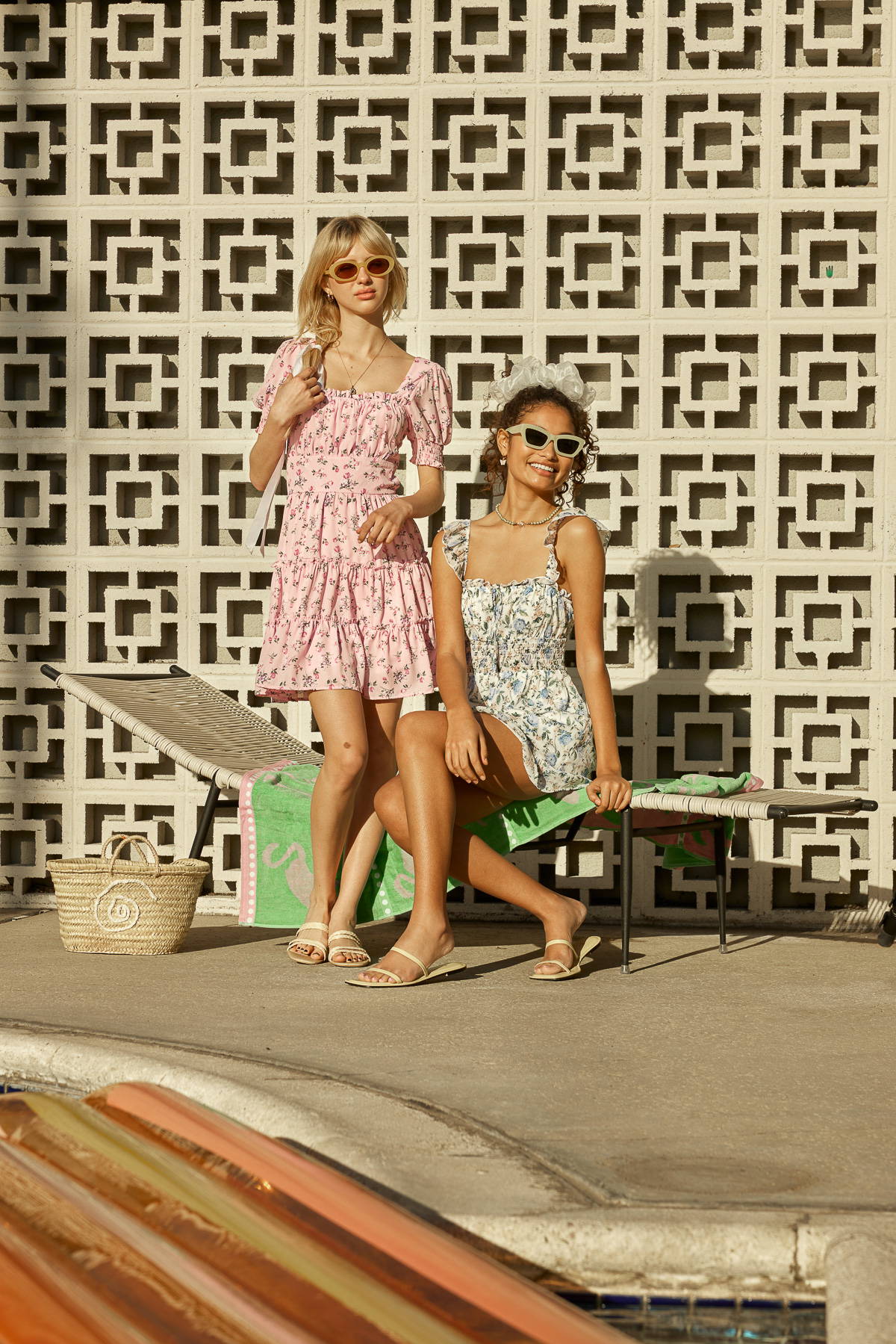 Trixxi Spring summer dress up getting ready to go to the pool in pink floral mini dress and blue ruffle mini dress.