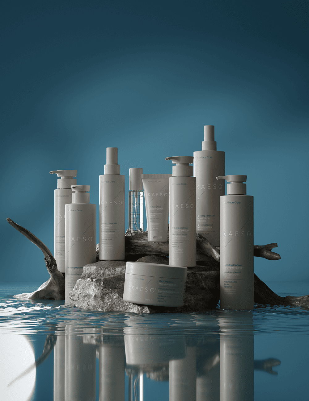 Various skincare products displayed on a textured surface against a blue background.