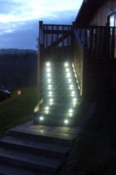 The solar decking lights switched on  at night.