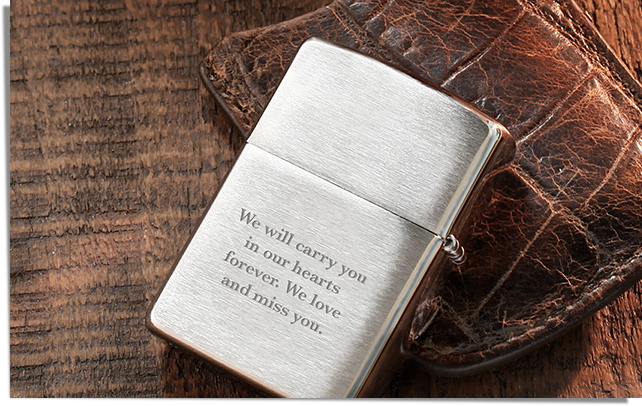 memorial lighter engraved with an inscription