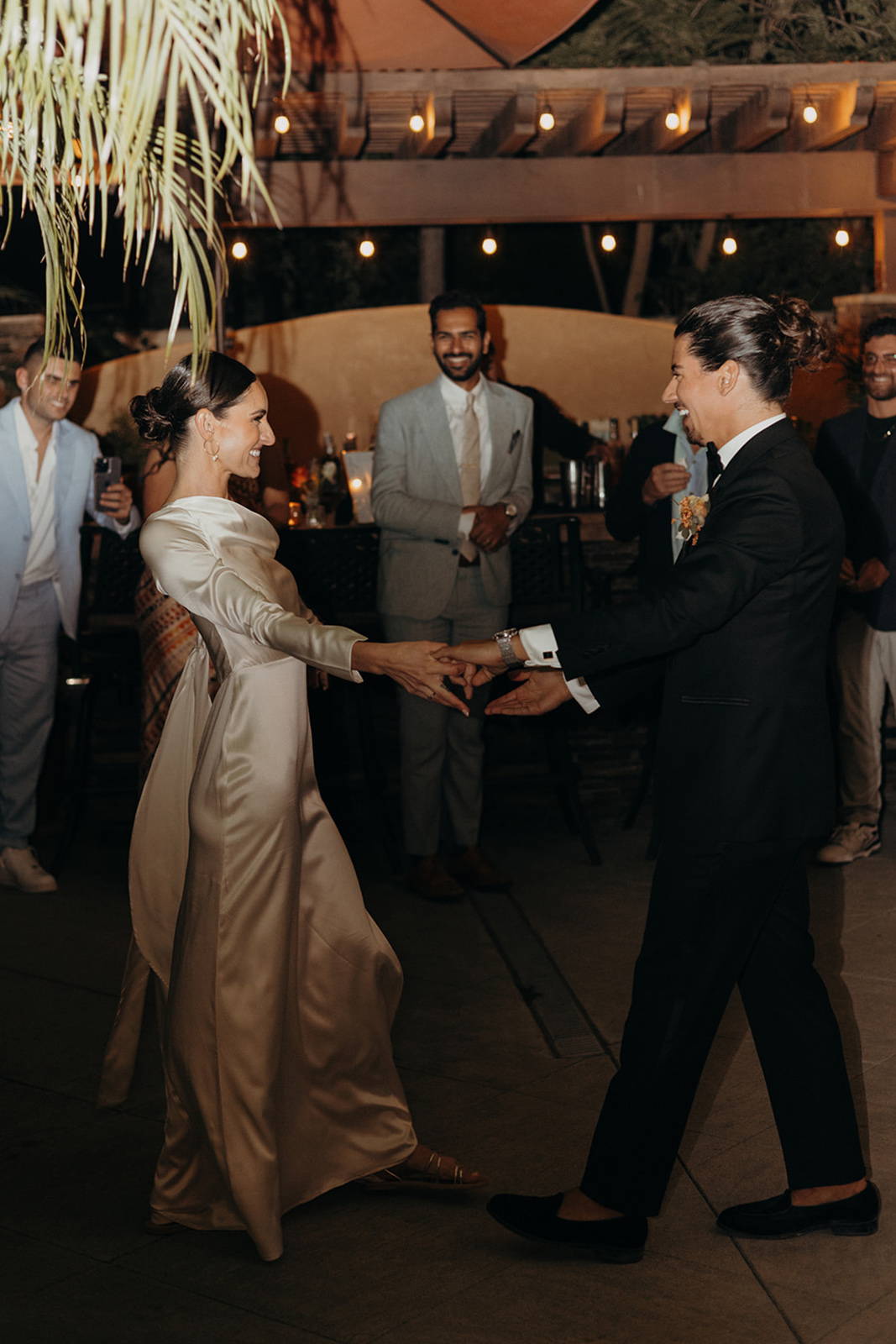 Bride and groom dancing together