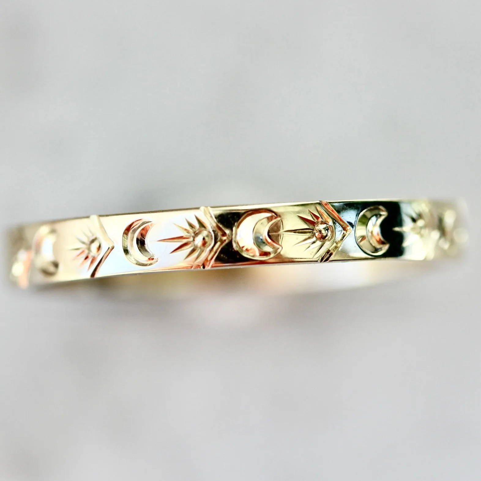 moon and star engraved gold band