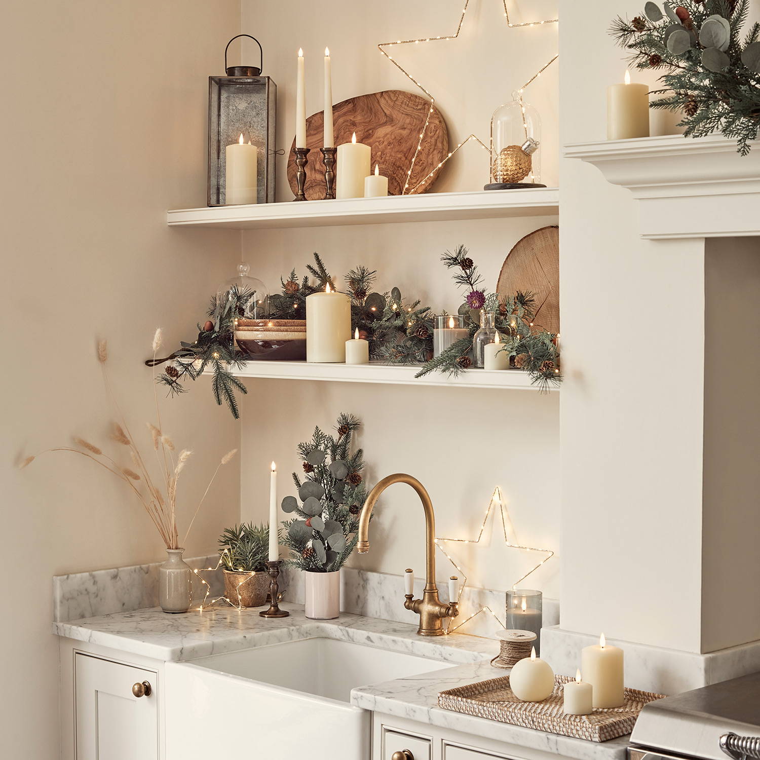 Christmas decorated kitchen shelves and sink.