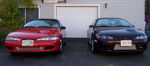 Red and maroon Mitsubishi Eclipse pair garage driveway front intercoolers 1999 Eclipse Shocker XL HornBlasters gallery photo 2