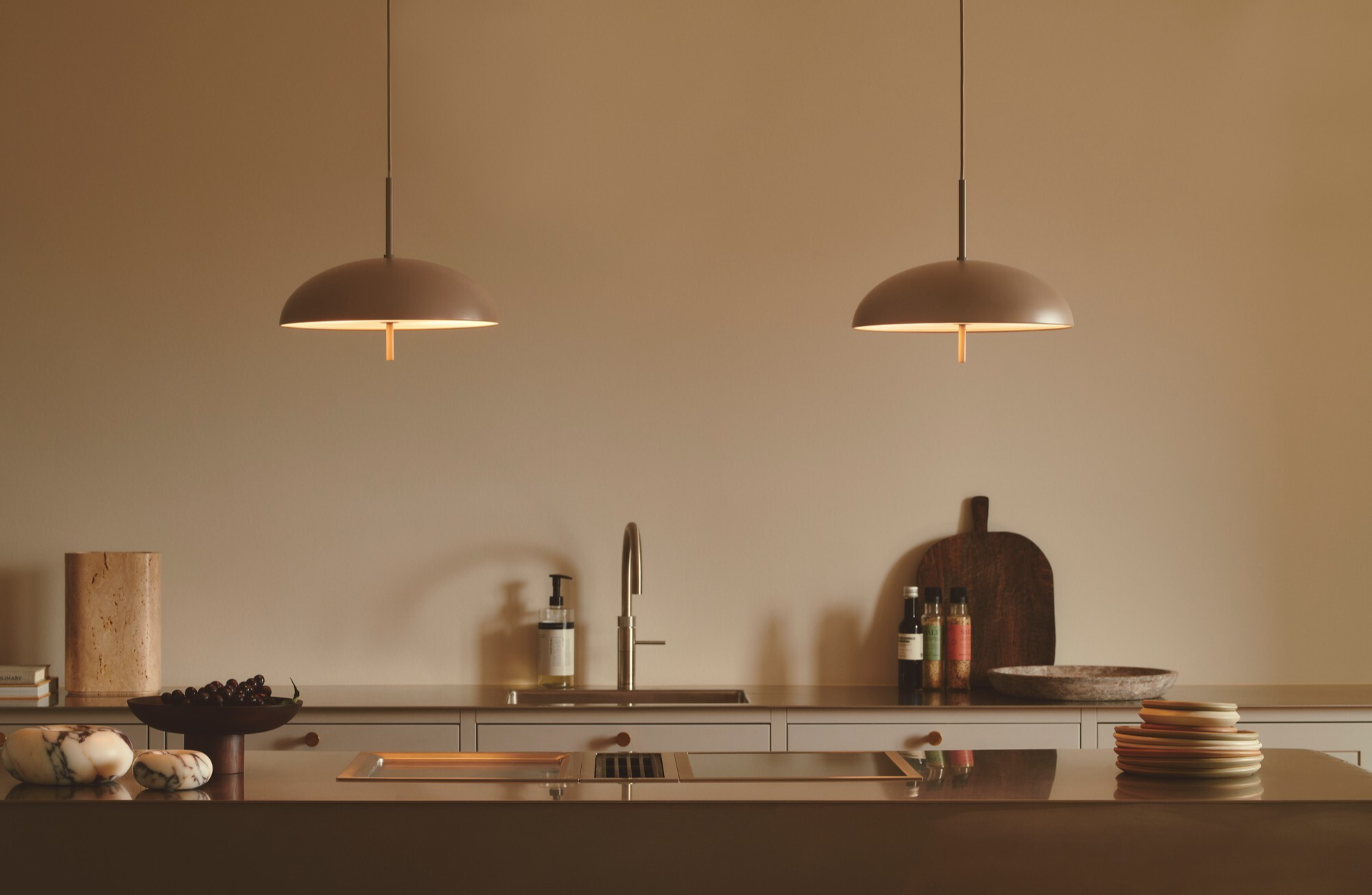 Scandinavian Wide Dome Pendant's over a minimalist kitchen island