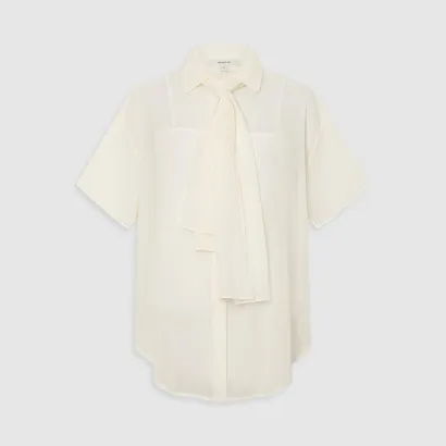 White short-sleeve blouse with a tie detail at the collar.