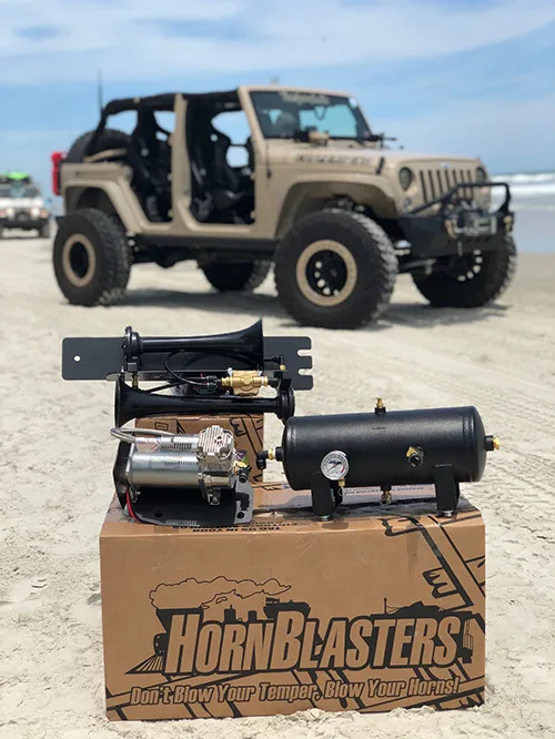Wrango JKU Horn Kit in front of Jeep JKU