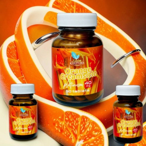 Bottles of dietary supplement with orange peels in the background.