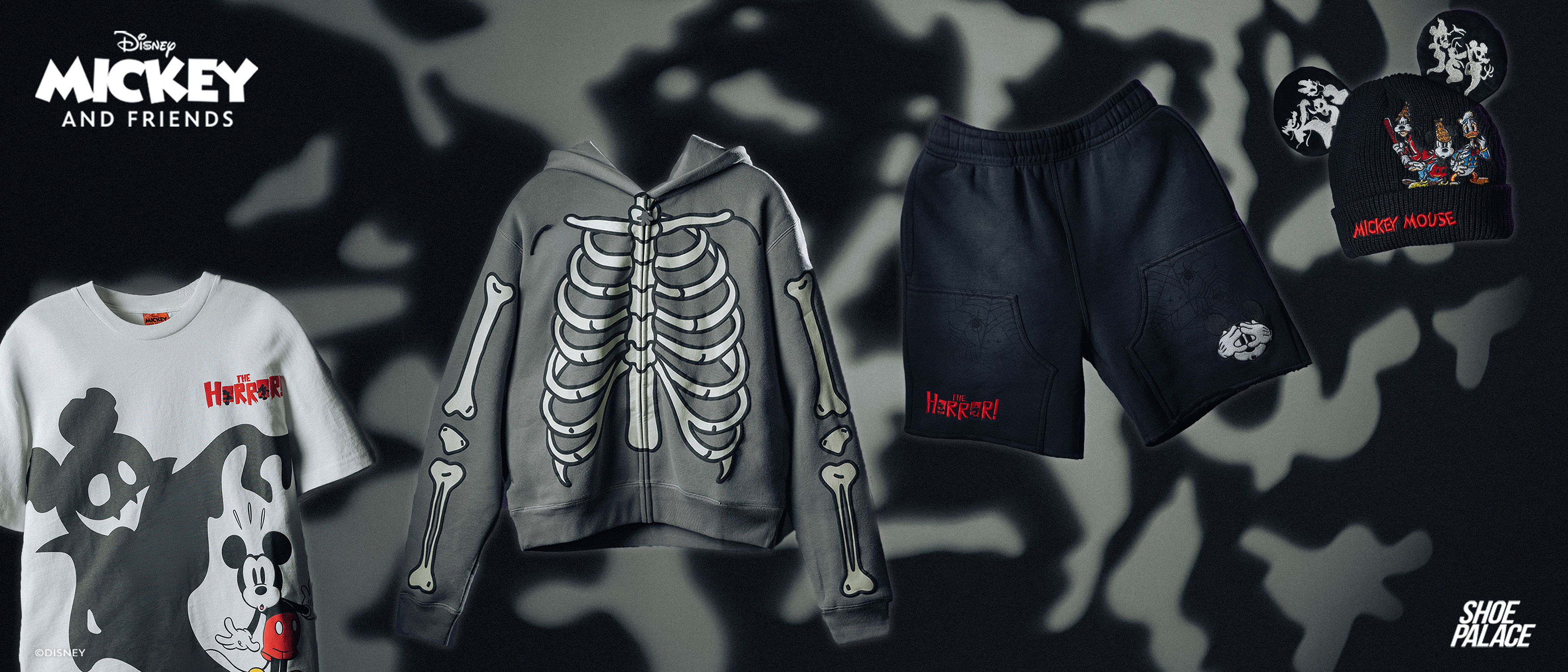 Mickey-themed clothing collection featuring t-shirts, hoodies, and shorts.