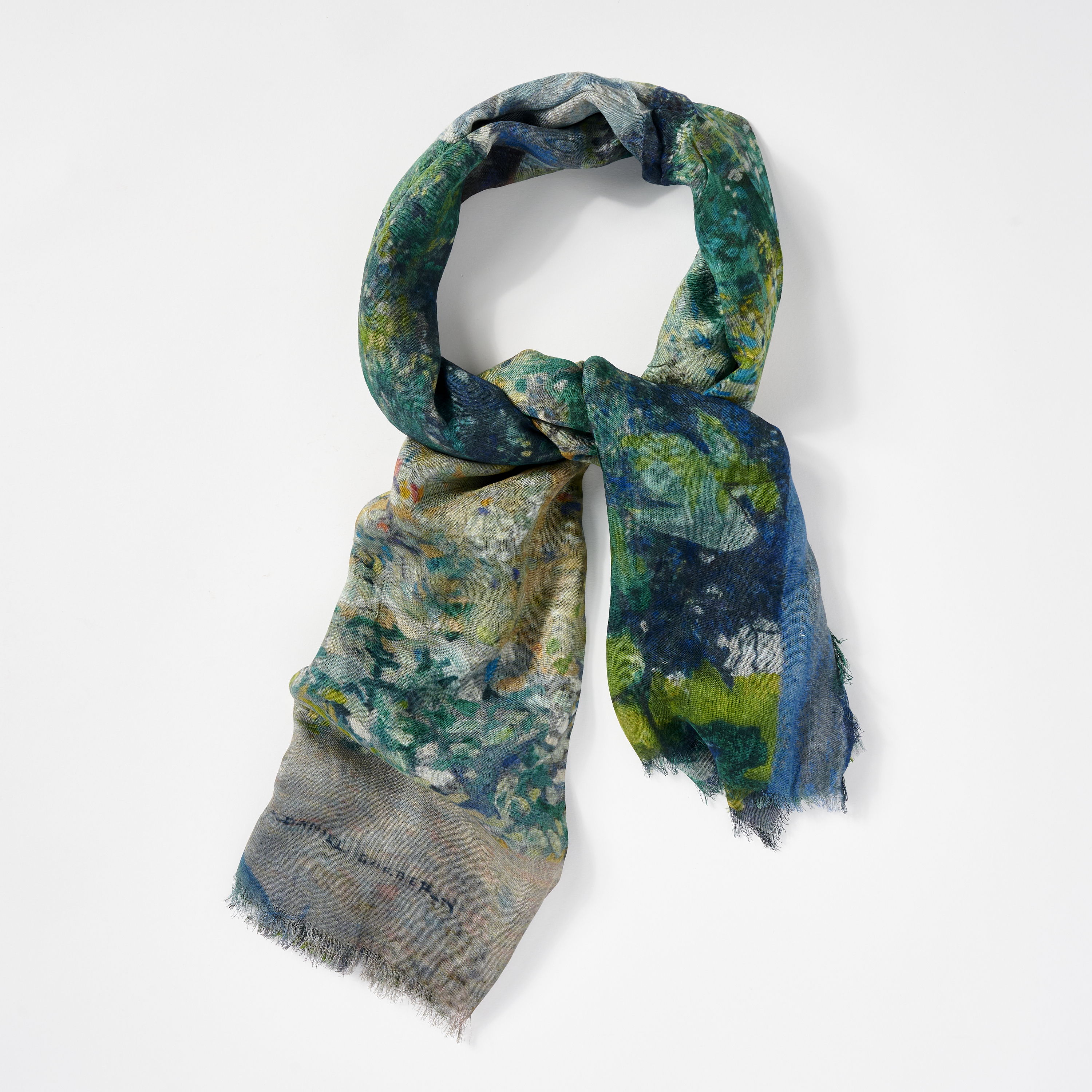 A colorful scarf with abstract floral patterns draped elegantly.