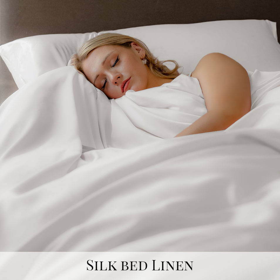 Girl sleeping on white silk sheets by Mayfairsilk
