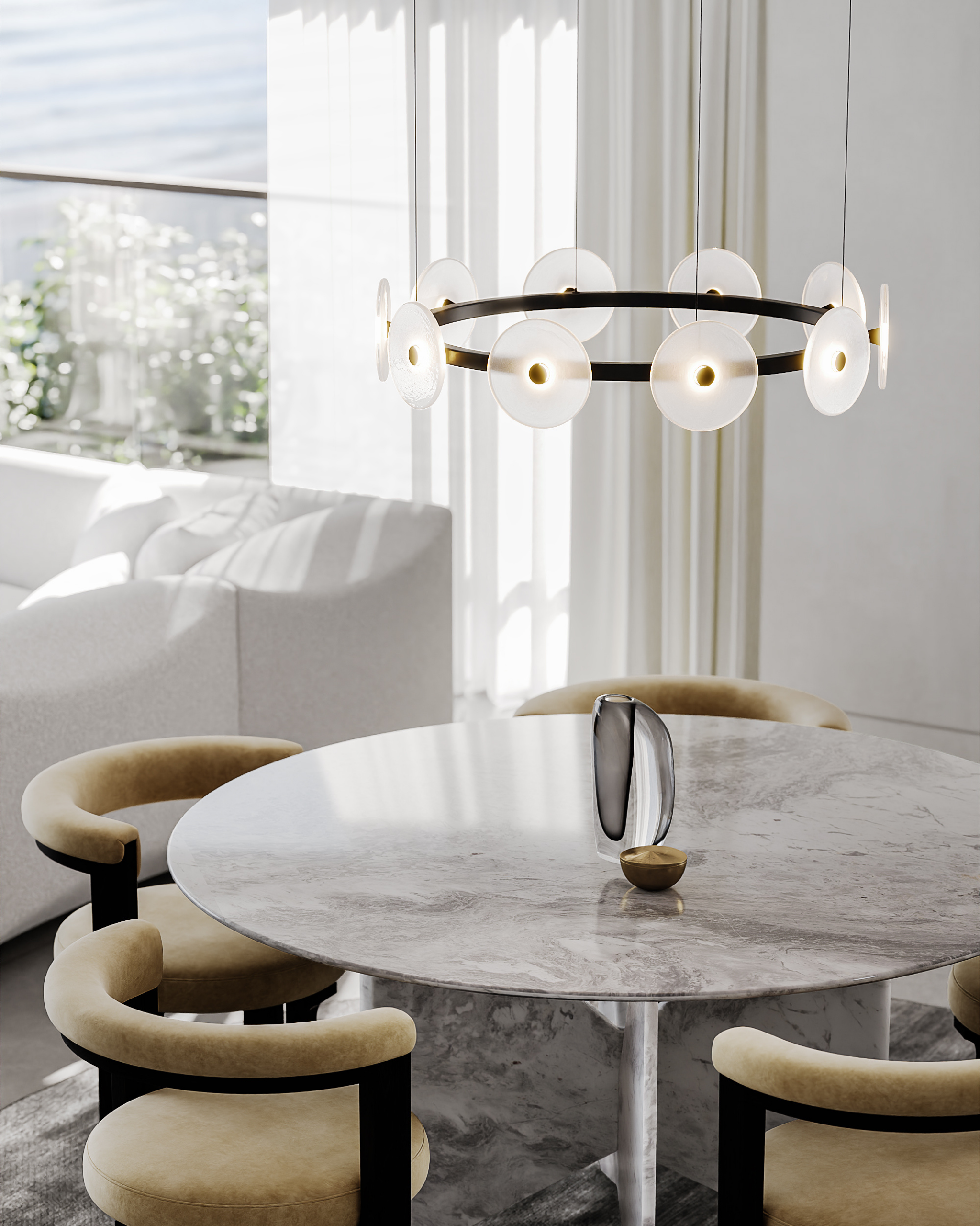 Modern dining room with marble table and stylish chairs under a chandelier.
