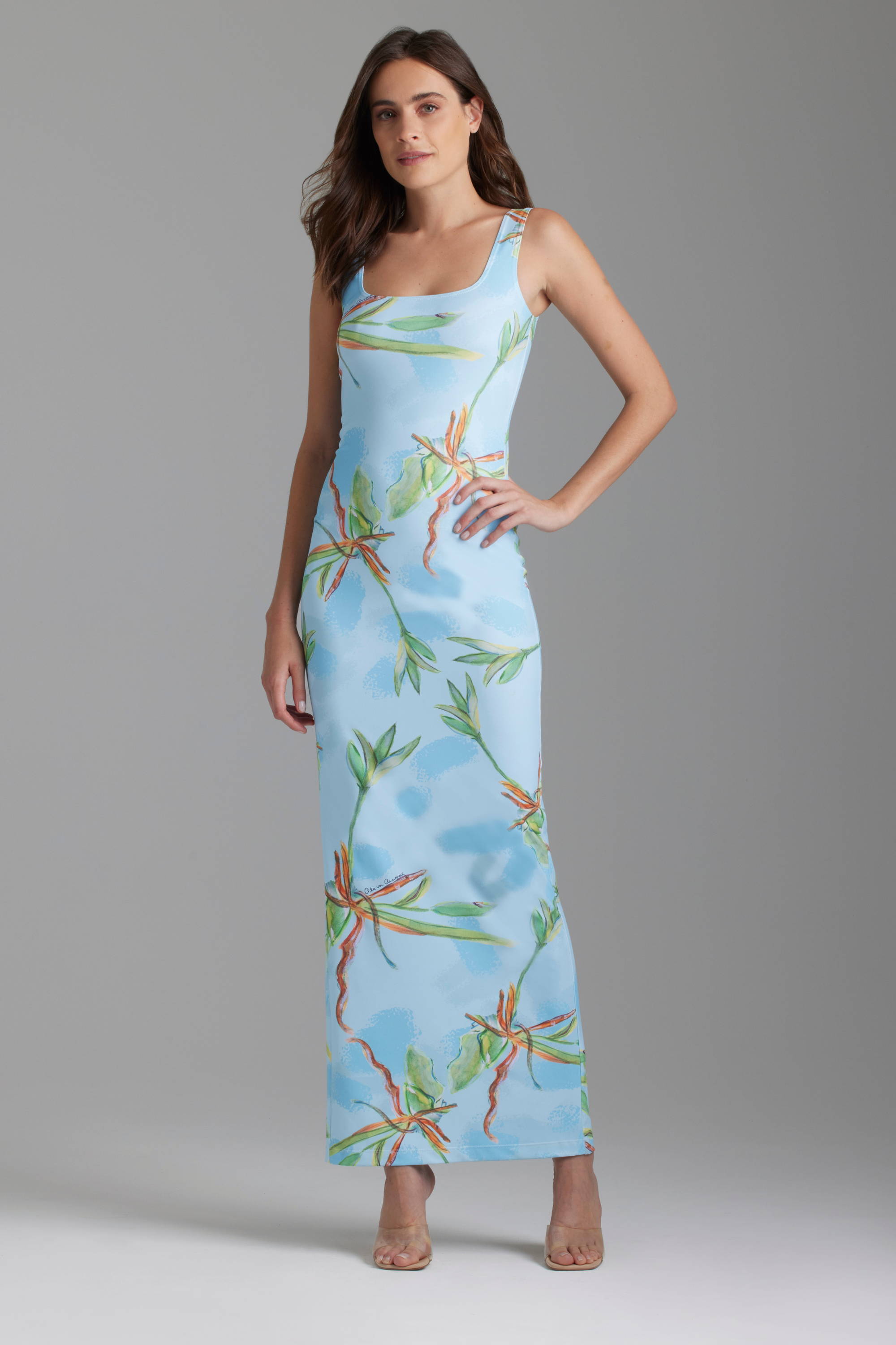 Woman wearing bamboo printed blue long stretch knit dress by Ala von Auersperg