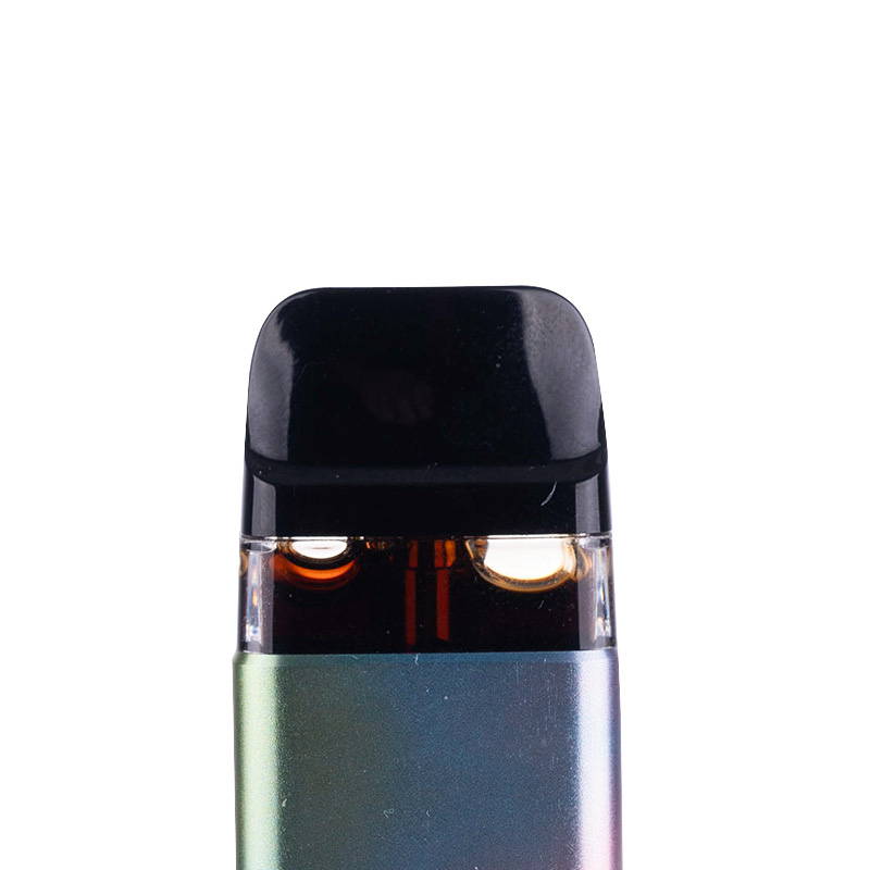 A photo of a vape pod with dark e-liquid caused by a damaged coil