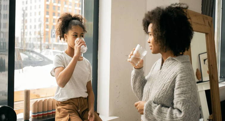 People drinking filtered water