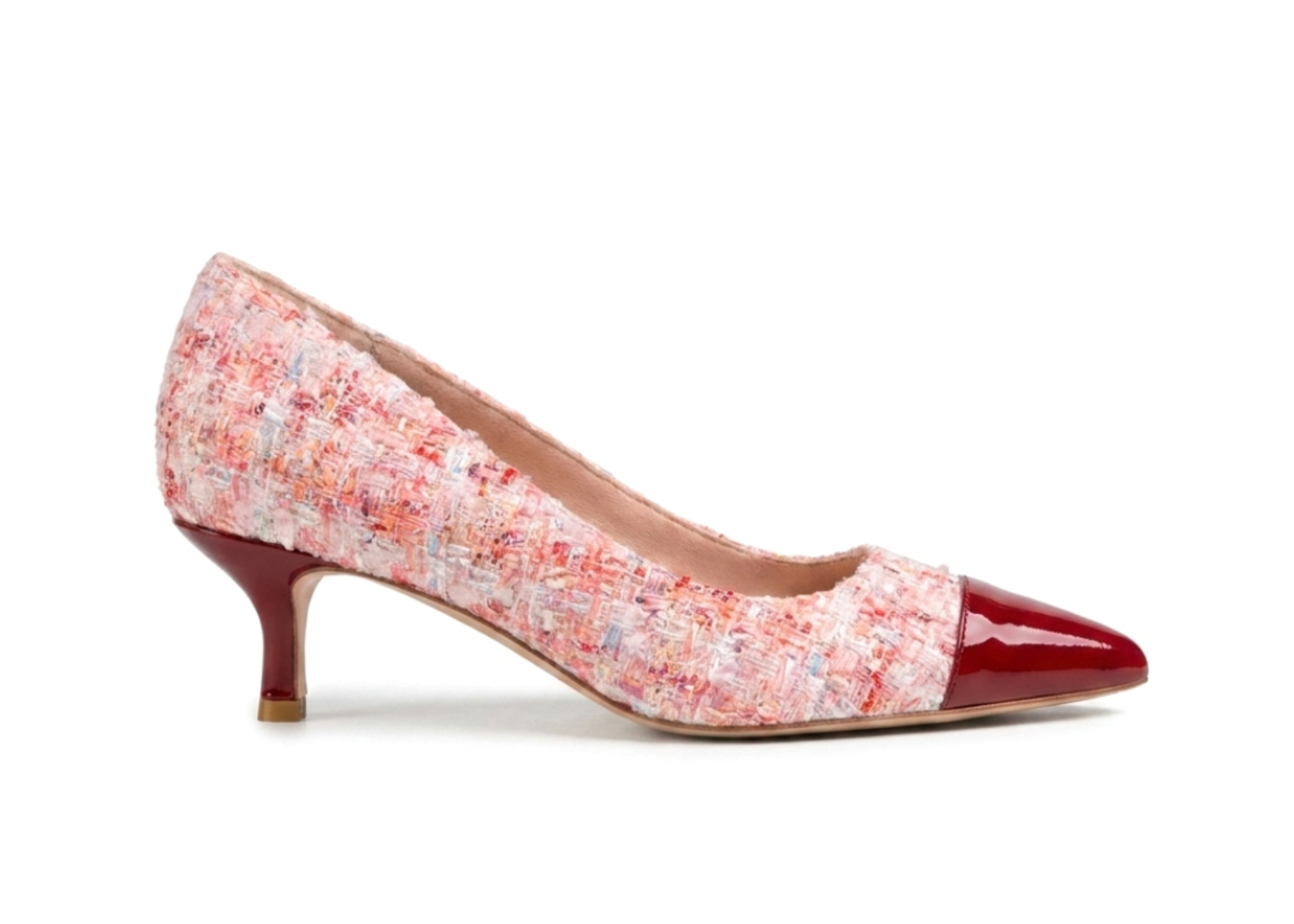 Floral patterned high heel shoe with a red pointed toe.